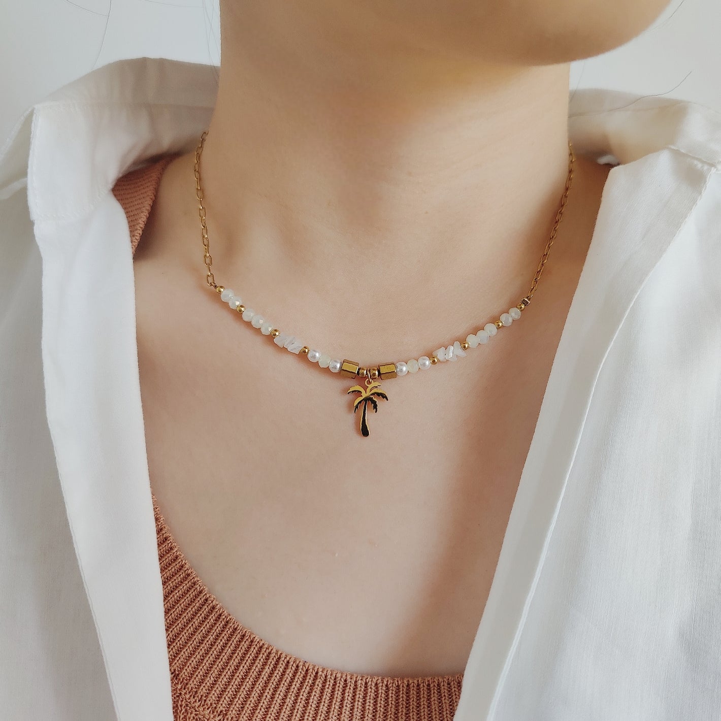 Collana con ciondolo a palma